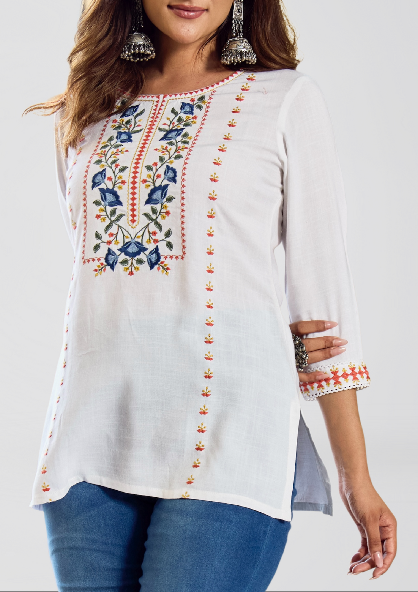 Pure White Embroidered Liva Kurti with Blue & Mustard Floral Detailing – Breezy Everyday Elegance