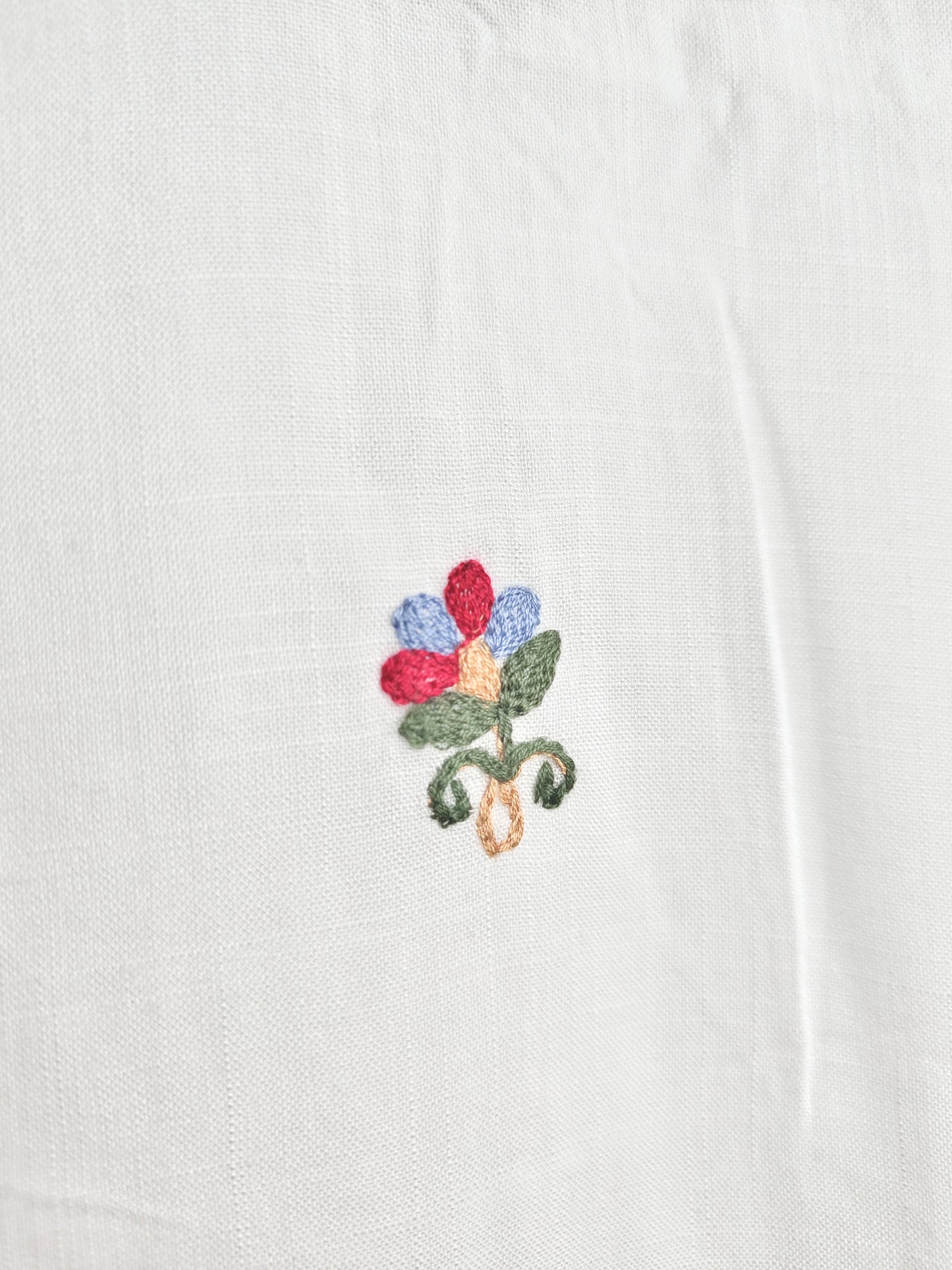 Pure White Liva Fabric Top with Colorful Floral Embroidery for Women